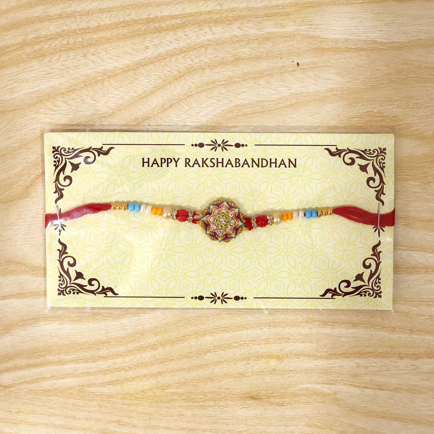 Full layout of Rangoli Mandala stone charm rakhi with pearl beads