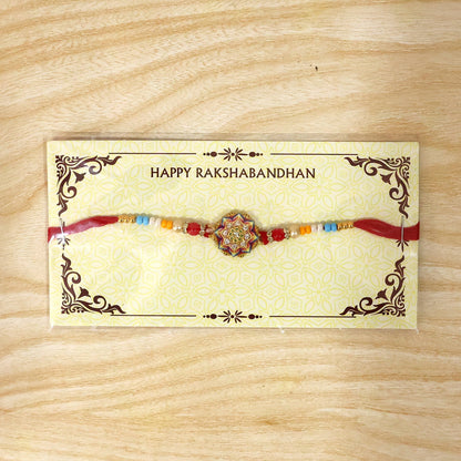 Full layout of Rangoli Mandala stone charm rakhi with pearl beads