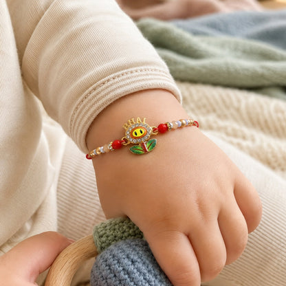 Side view of BHAI Smiley Flower Charm Beads Rakhi