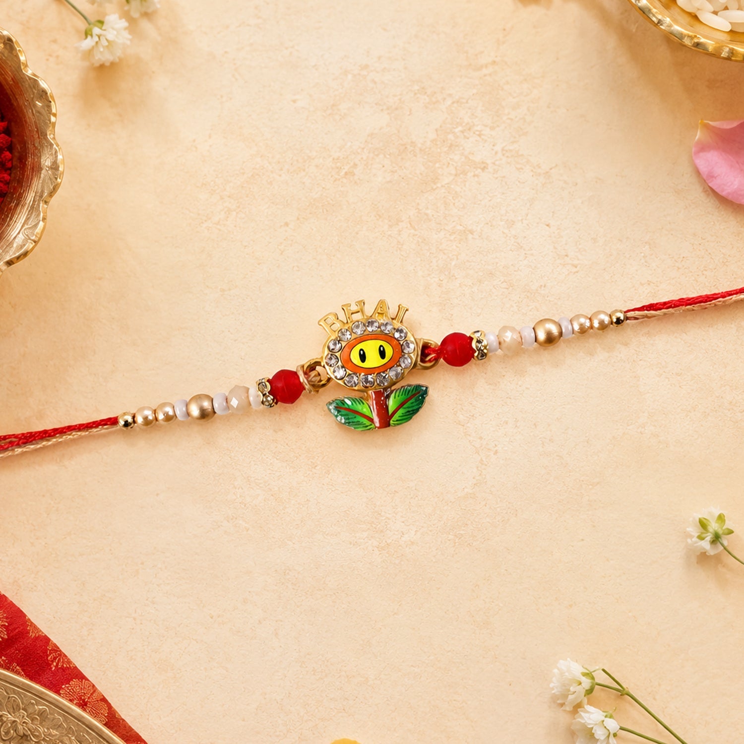Close-up of BHAI Smiley Flower Charm on Rakhi