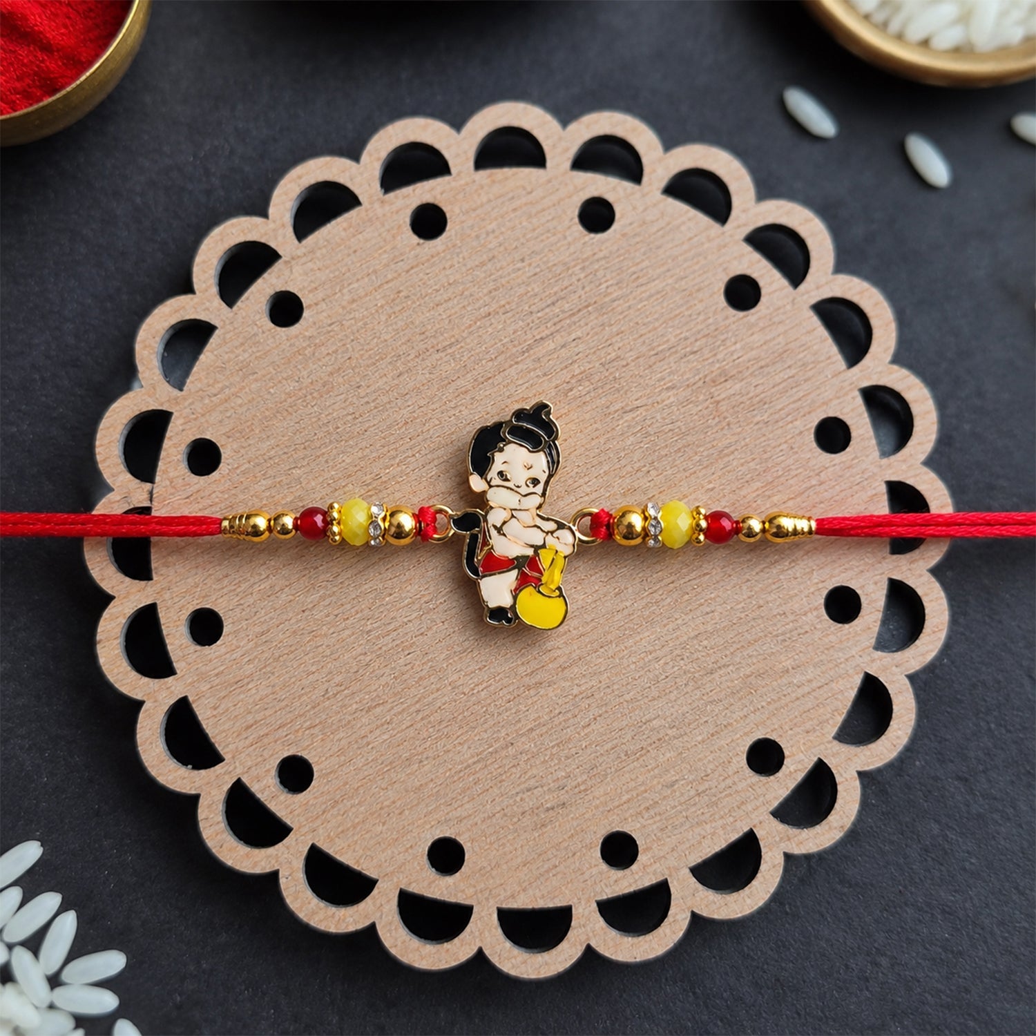 Bal Hanuman with Gada charm rakhi on white background