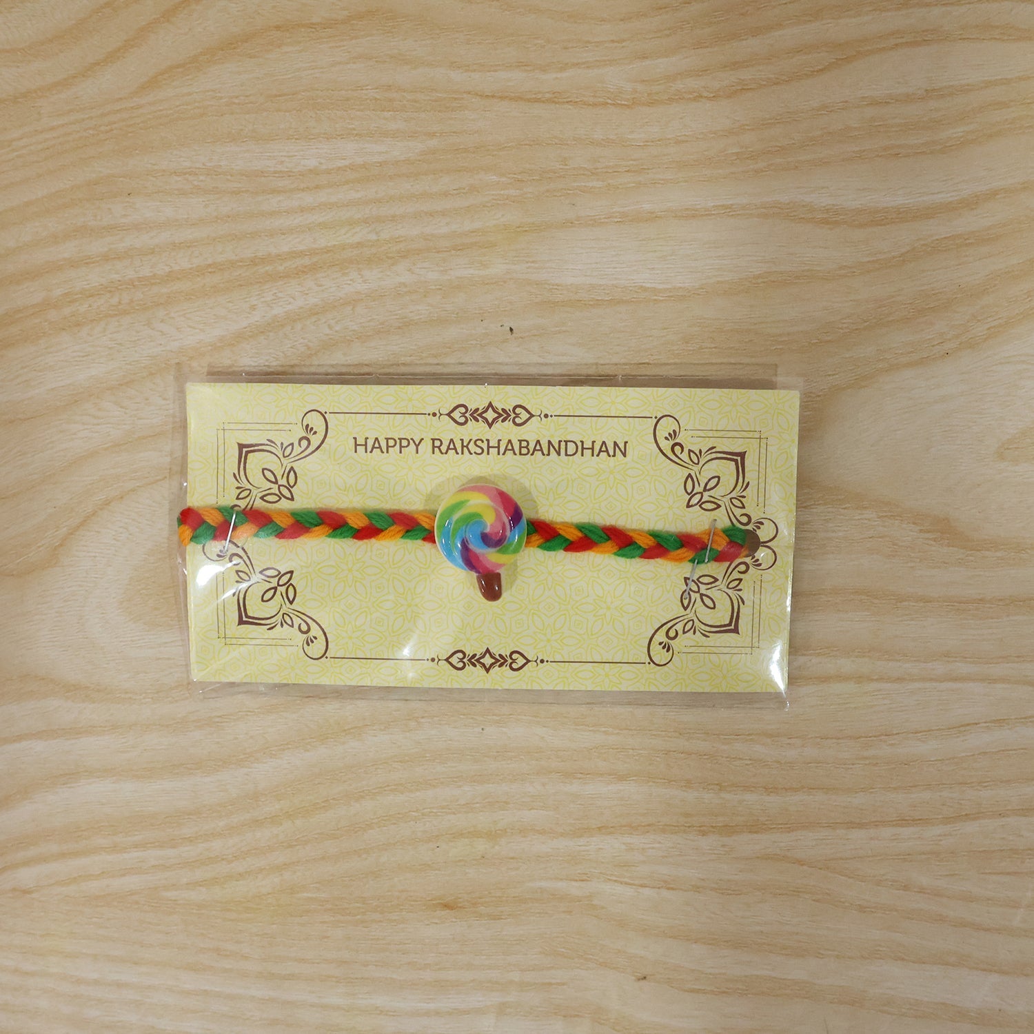 Cute Candy Charm Braided Thread Rakhi for Brother (1 Pc)