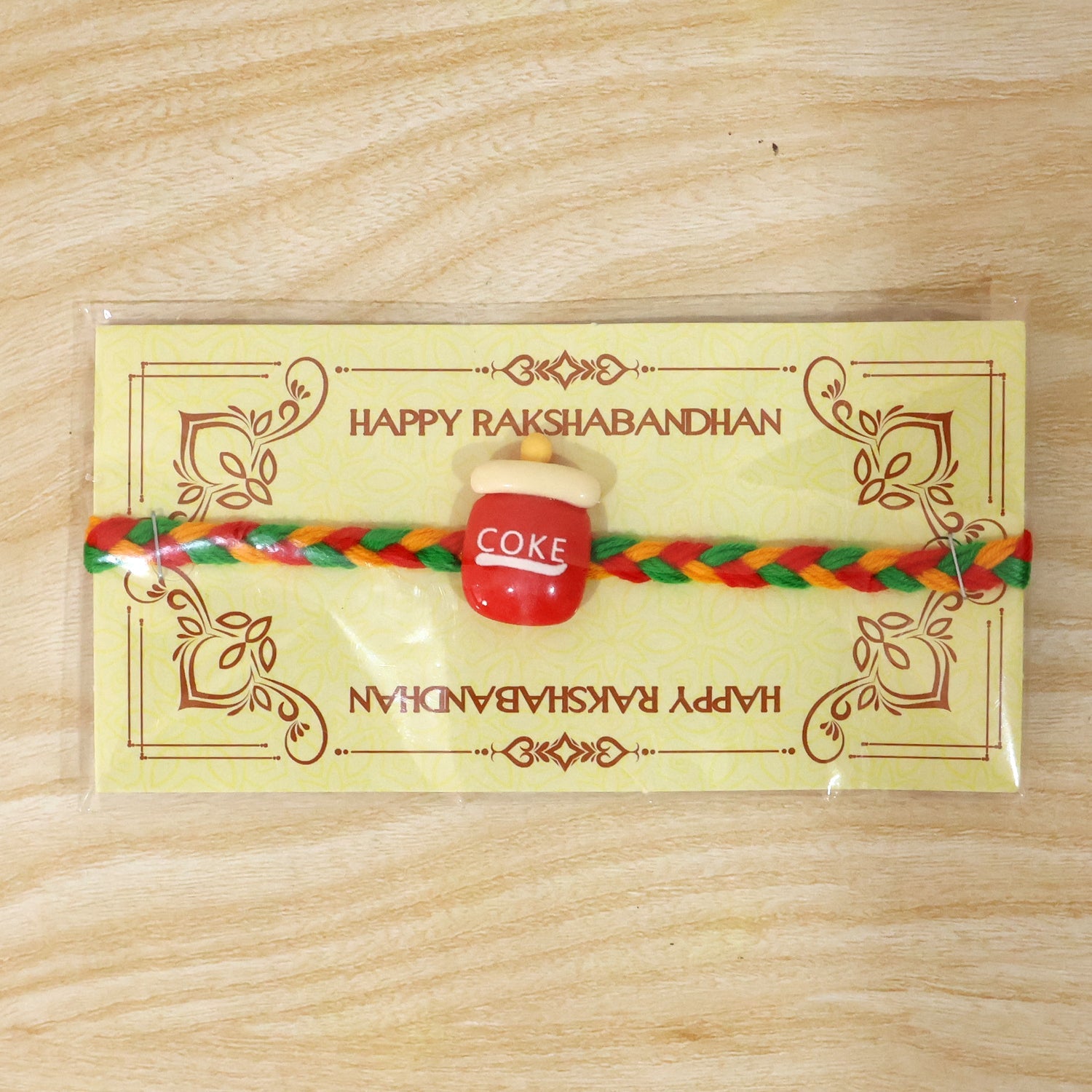 Cute Coke Bottle Charm Braided Thread Kids Rakhi for Brother (1 Pc)