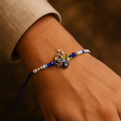 Om Flower Bouquet Meena Charm With Beads Rakhi for Brother (1 Pc)