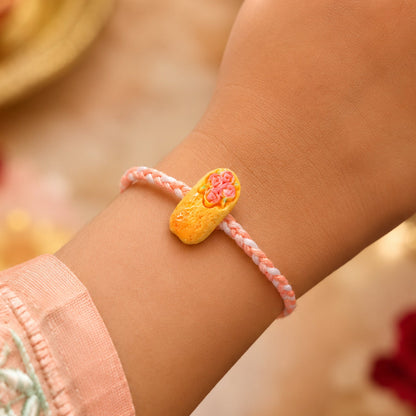 Cute Cake Charm Braided Thread Kids Rakhi for Brother (1 Pc)