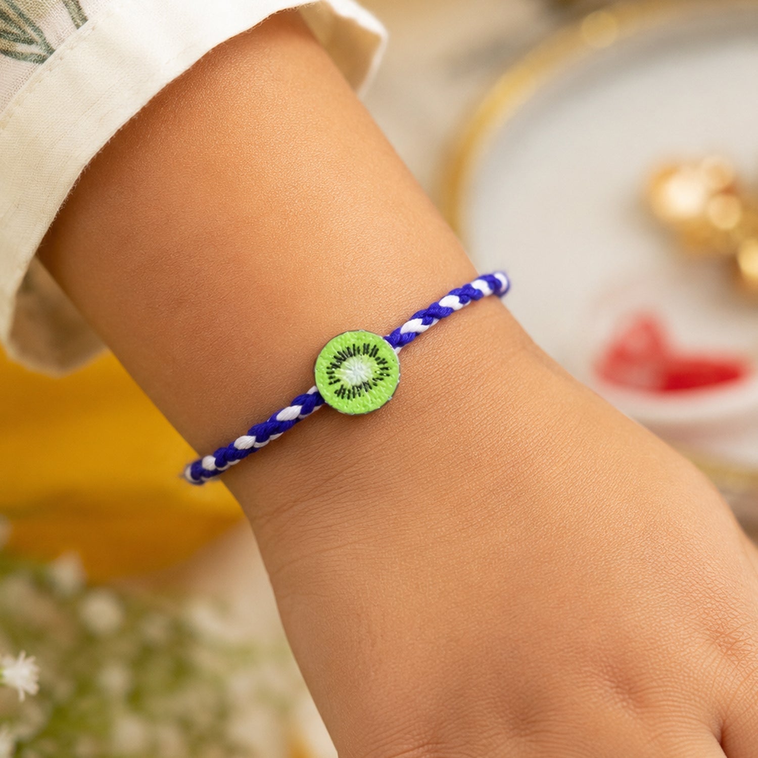 Cute Kiwi Fruit Charm Braided Thread Kids Rakhi for Brother (1 Pc)