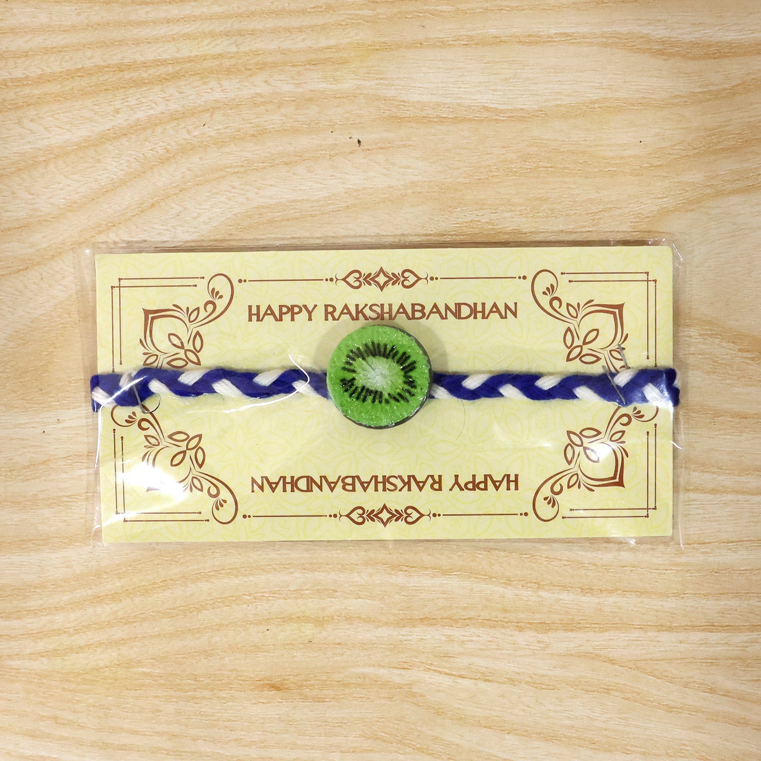 Cute Kiwi Fruit Charm Braided Thread Kids Rakhi for Brother (1 Pc)