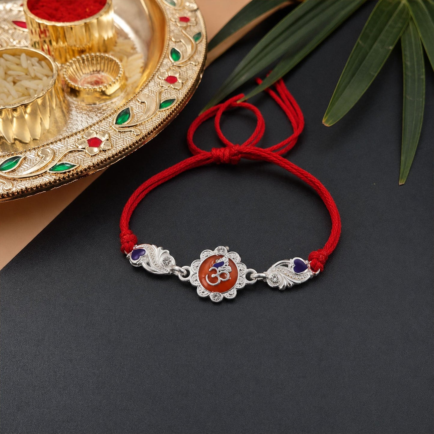 Silver Om Floral Charm With Dori Rakhi for Brother (1 Pc)