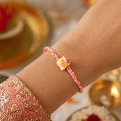 Cute Strawberry Biscuit Charm Braided Thread Kids Rakhi for Brother (1 Pc)
