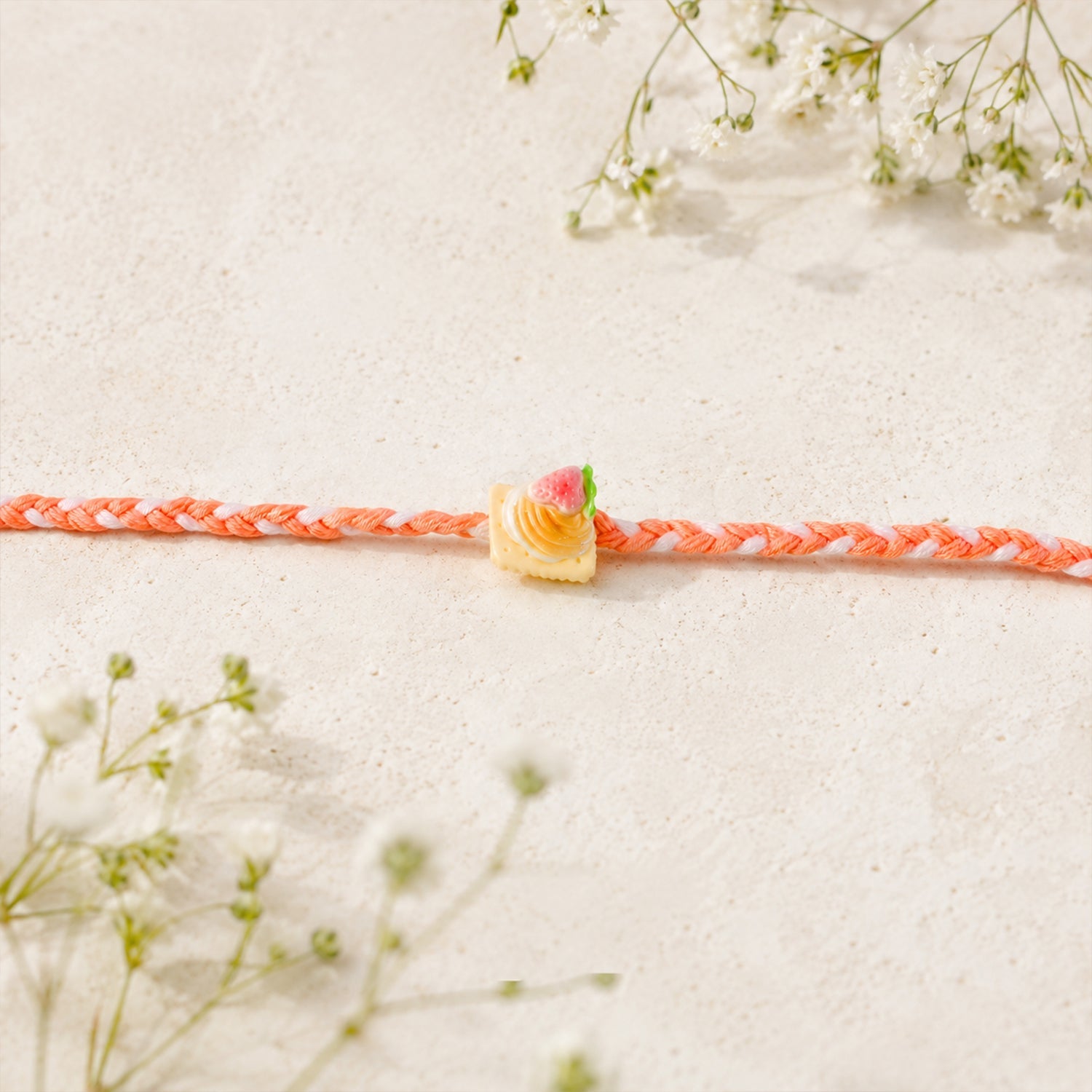 Cute Strawberry Biscuit Charm Braided Thread Kids Rakhi for Brother (1 Pc)