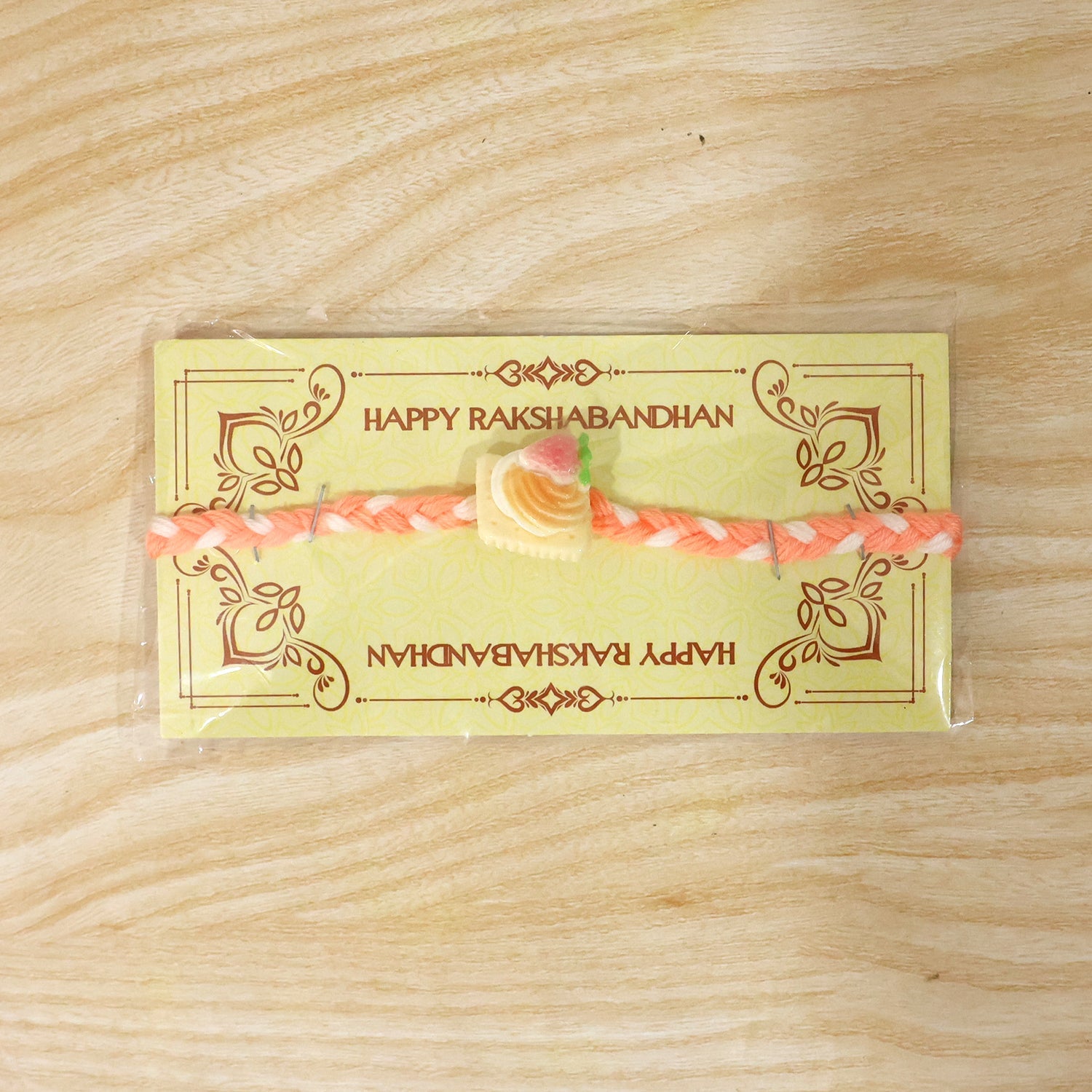 Cute Strawberry Biscuit Charm Braided Thread Kids Rakhi for Brother (1 Pc)