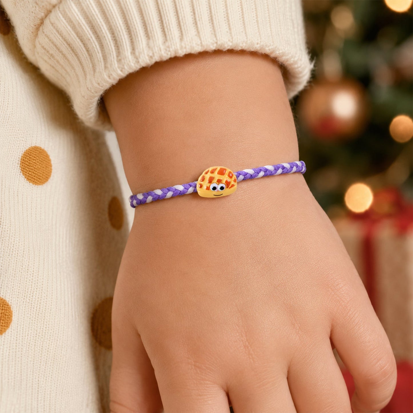 Smiley Waffle Charm Braided Thread Rakhi tied