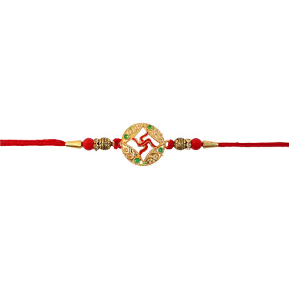 Close detail of swastik charm on rakhi with bead accents
