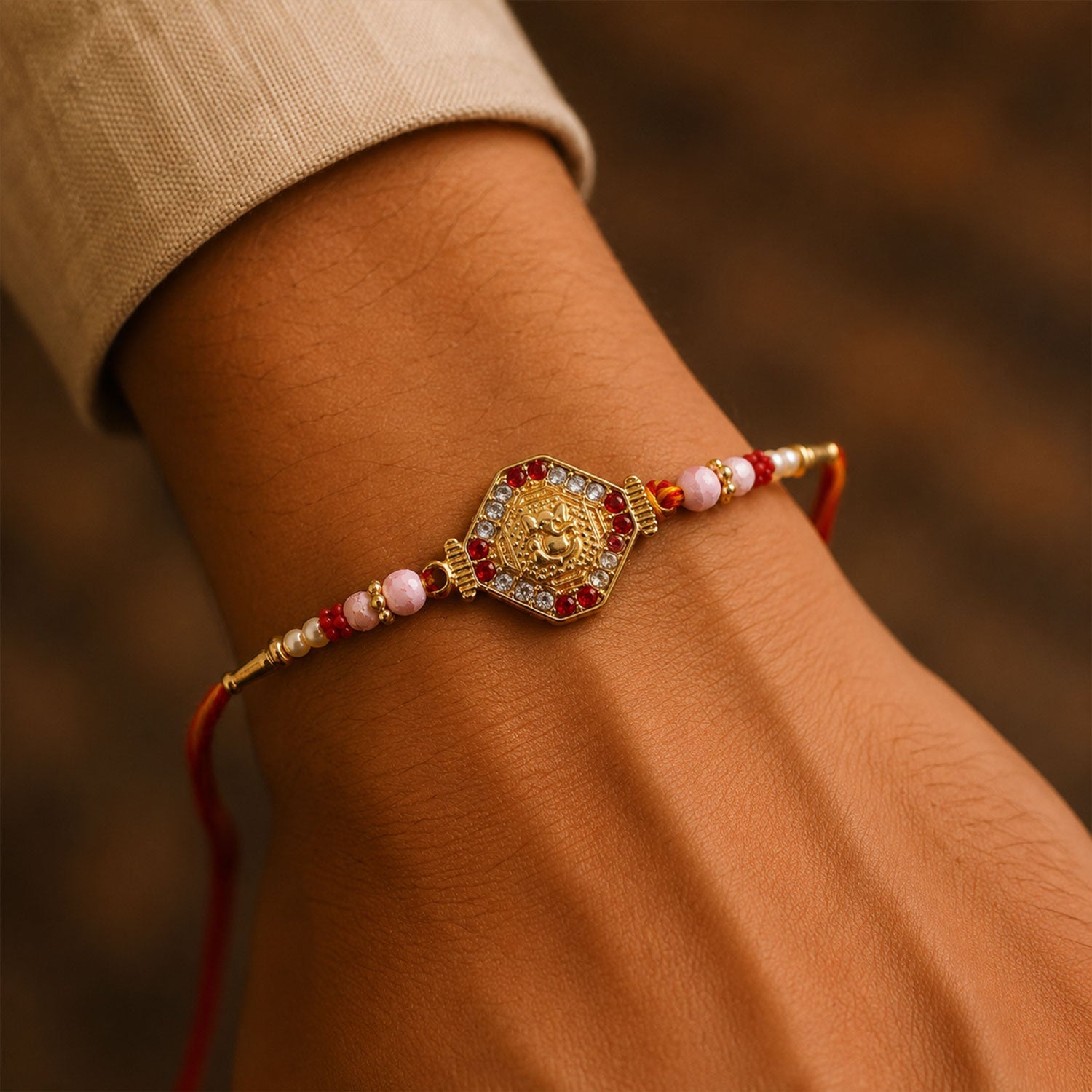 Closeup of Ganesh design on Hexagon Stone Charm Rakhi