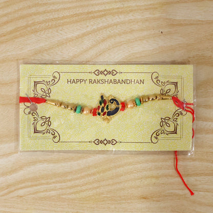Festive Raksha Bandhan Rakhi with peacock charm and beads