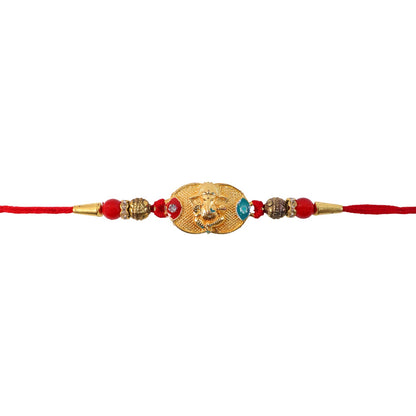 Golden Ganesh Oval Charm Rakhi tied with decorative thread
