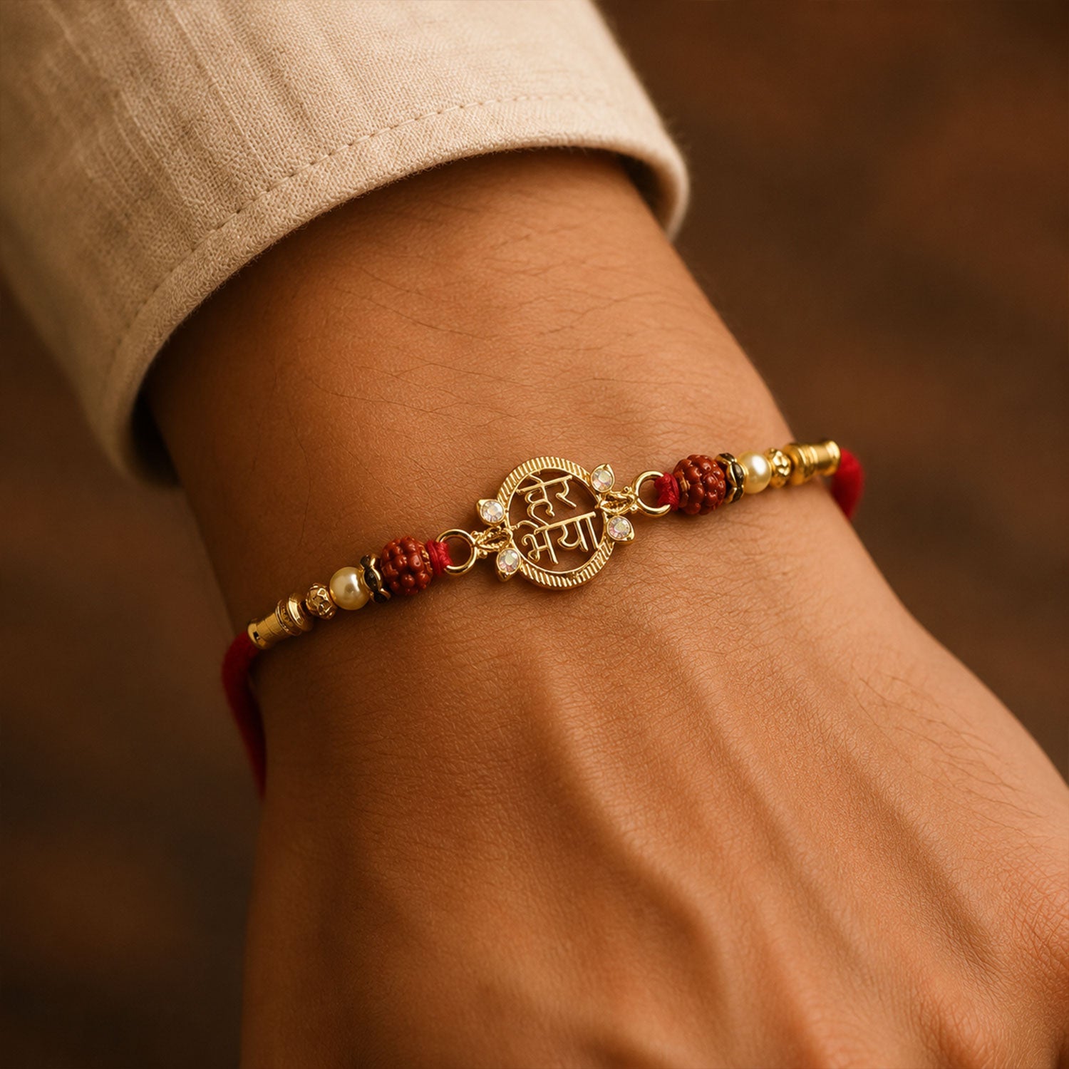 Close-up of Rudraksha and pearl beads on rakhi