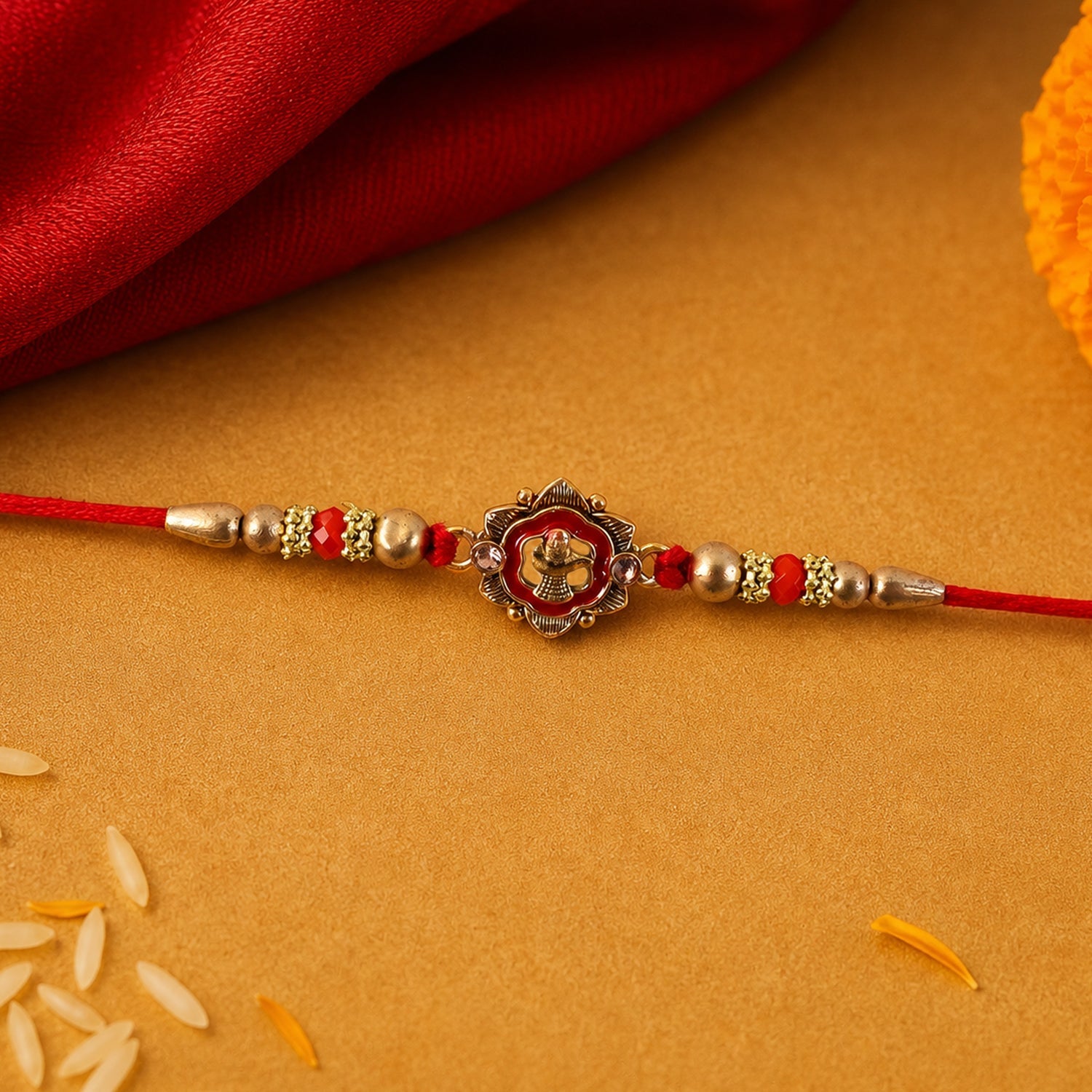 Close-up of floral charm detail on Rakhi