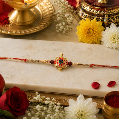 Designer rakhi showcasing tortoise flower stone and Rudraksha beads