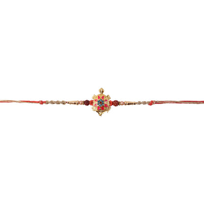 Rakhi tied with intricate tortoise flower charm and beads