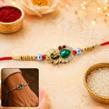 Peacock Emerald Stone Rakhi – Elegant with Pearl Beads for Brothers