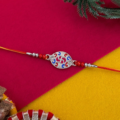 Silver Swastik Meena Oval Charm Rakhi with beads side view