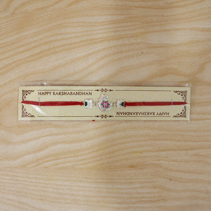 Silver Peacock Flower Heart Rakhi detail showing flower heart design