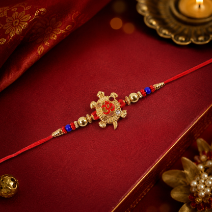 Top view of Golden Tortoise Om Meena beaded rakhi