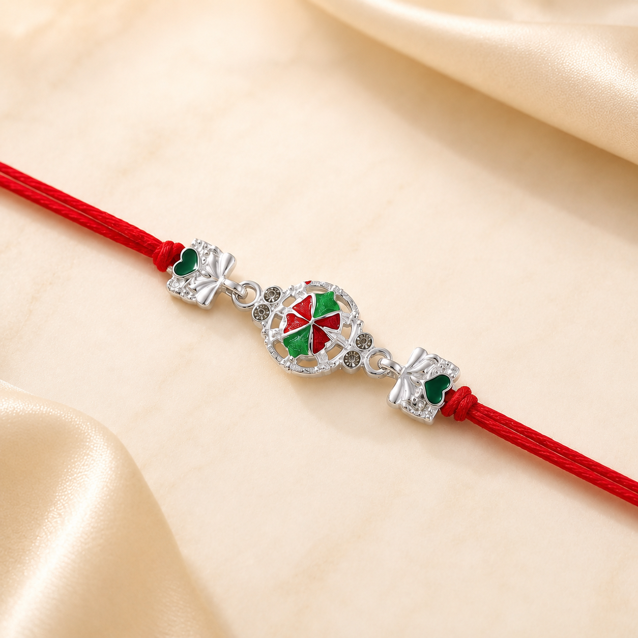 Close-up of silver pinwheel flower charm rakhi