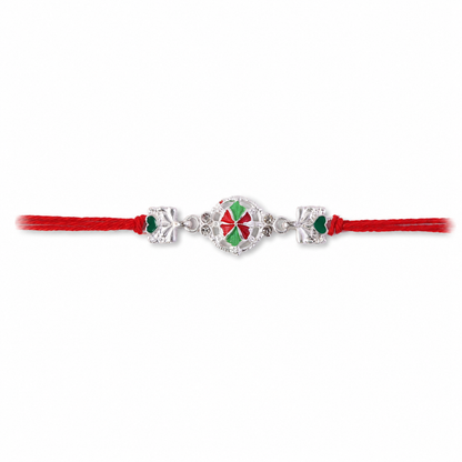Silver pinwheel flower rakhi showing intricate design