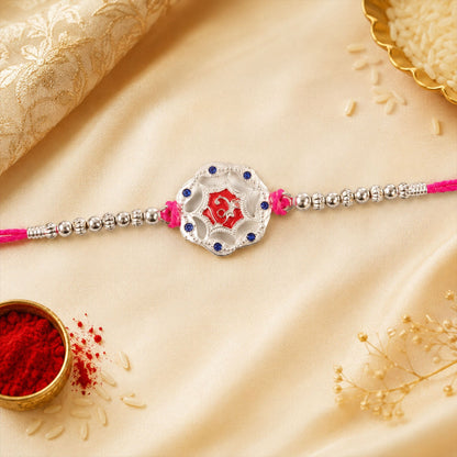 Silver floral rakhi with round stone & beads, side view for Raksha Bandhan