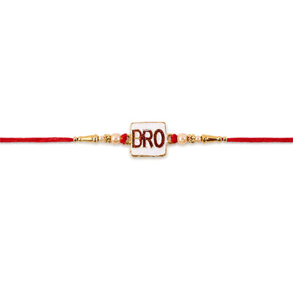 Traditional yet modern bro charm rakhi with pearls