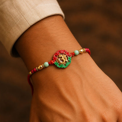 Stylish Golden Om Charm rakhi for Raksha Bandhan