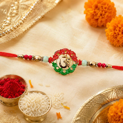 Golden Om rakhi showing detailed design