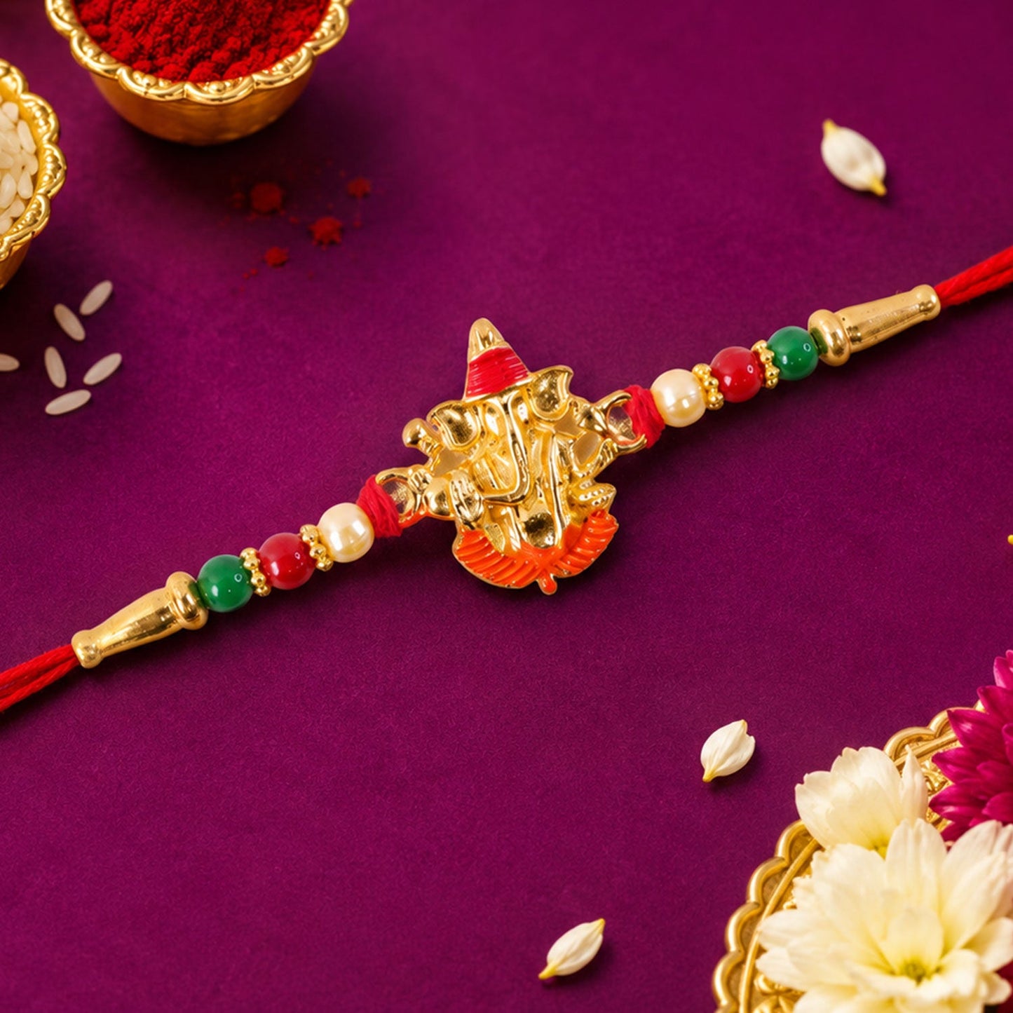 Lord Ganesha Meenakari Work Pearl Beaded Rakhi for Brother