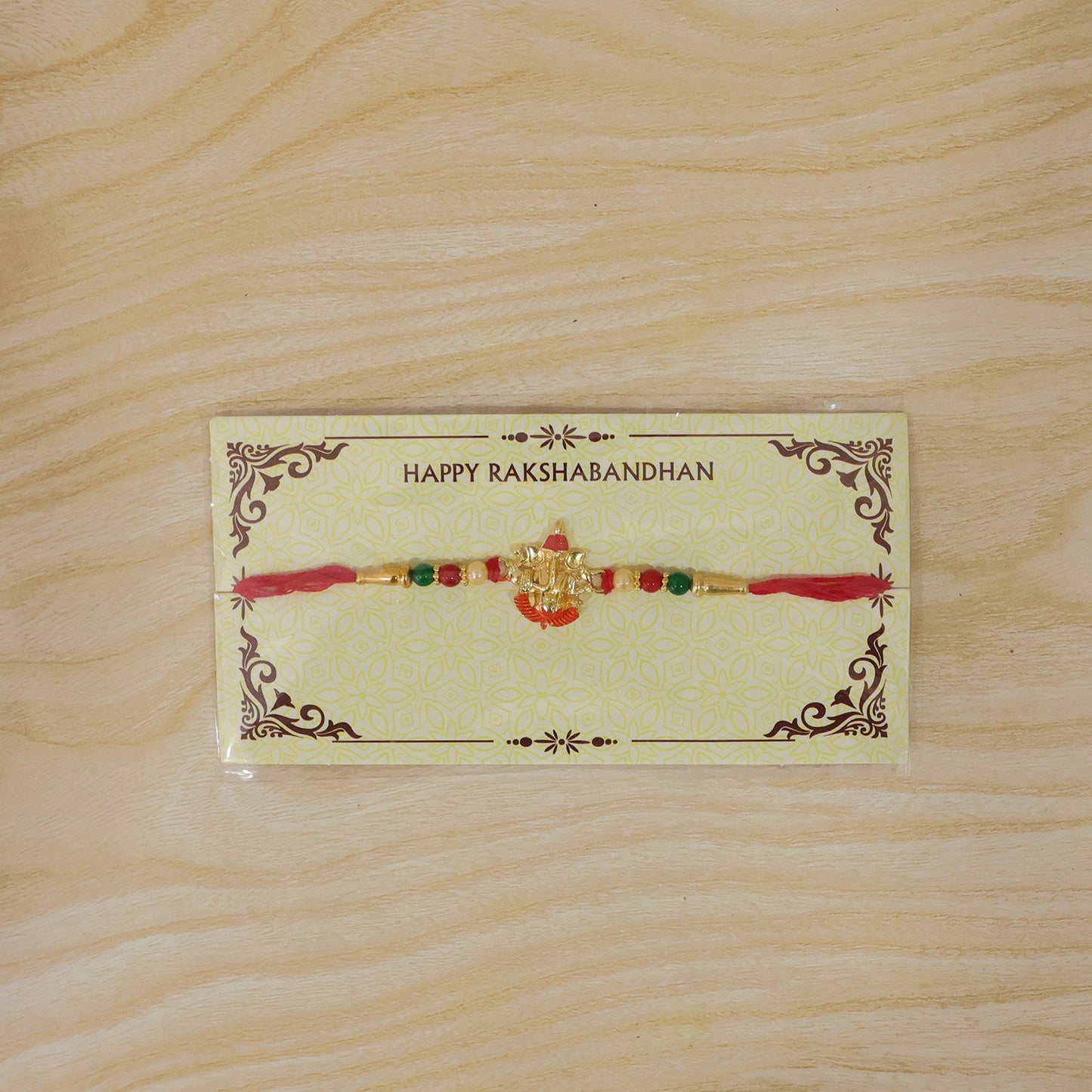 Lord Ganesha Meenakari Work Pearl Beaded Rakhi for Brother