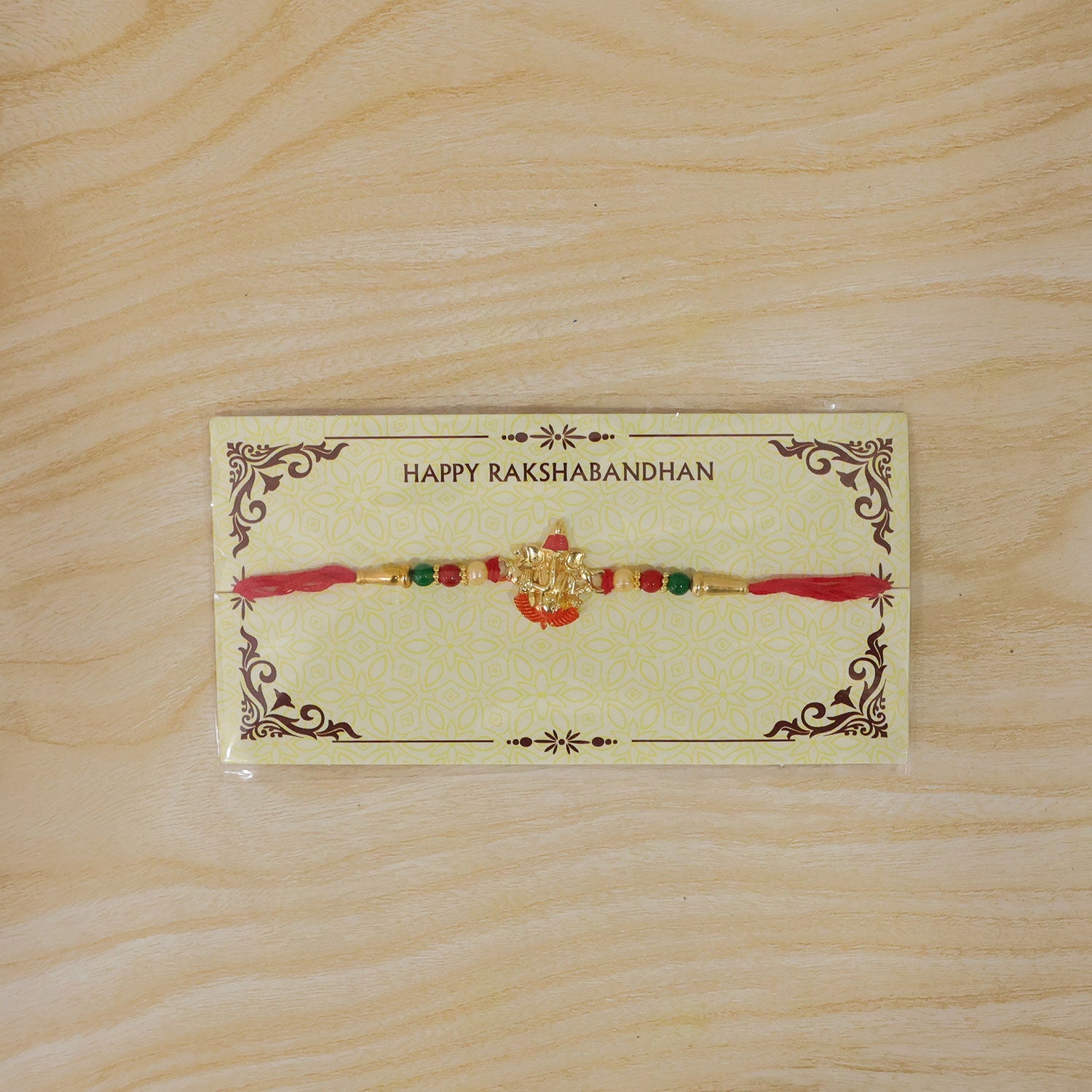 Lord Ganesha Meenakari Work Pearl Beaded Rakhi for Brother