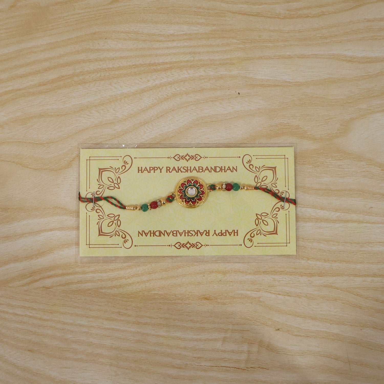 Round Meenakari Rakhi with Kundan Stone