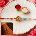 Rakhi for Brother Golden Peacock Turquoise Pearls