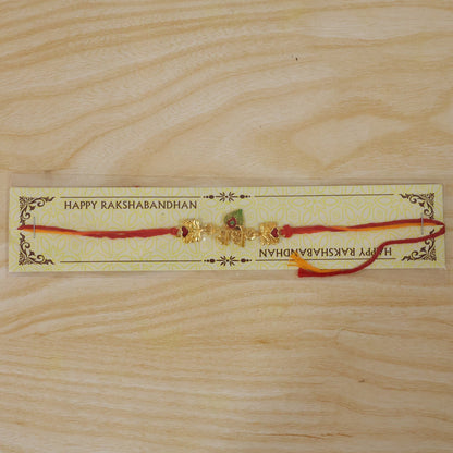 Golden 'Radhe' Rakhi with Peacock Feather