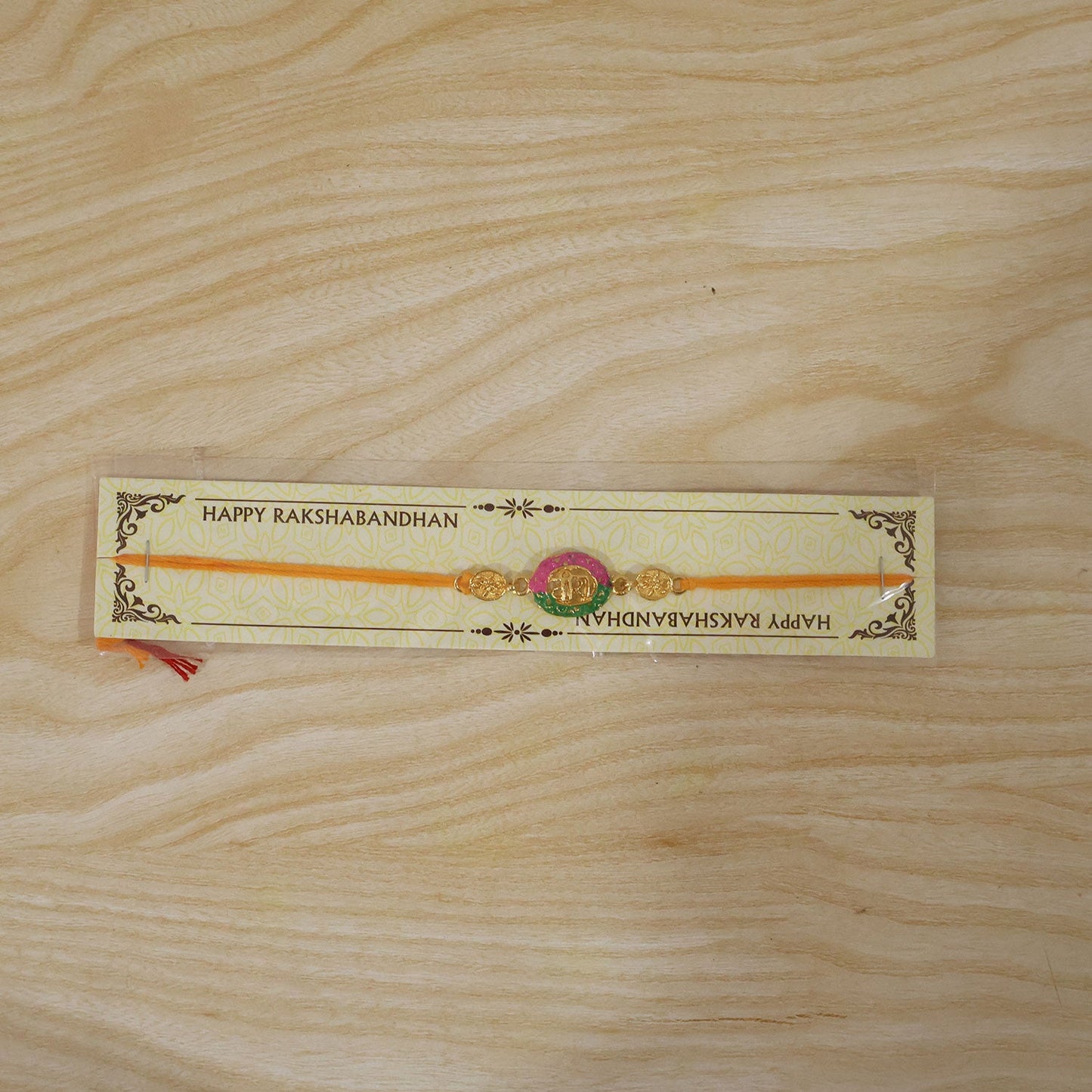 Pink & Green Meenakari Oval Veera Rakhi