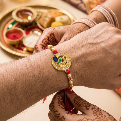 Golden Peacock Rakhi with CZ Stones