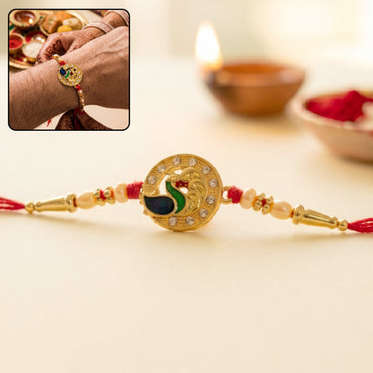 Golden Peacock Rakhi with CZ Stones