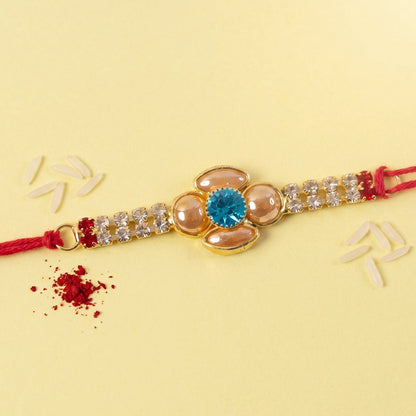 Floral American Diamond Rakhi with Turquoise