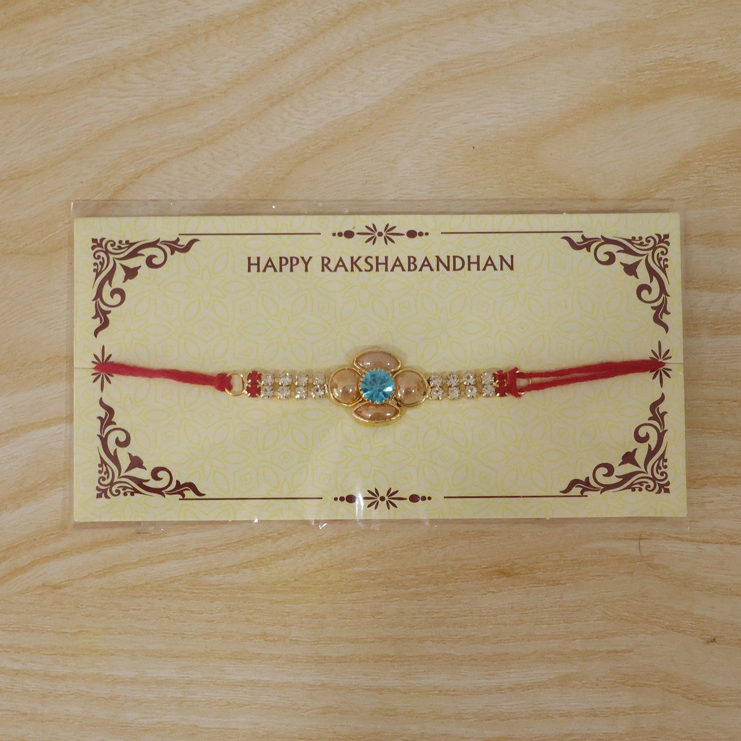 Floral American Diamond Rakhi with Turquoise