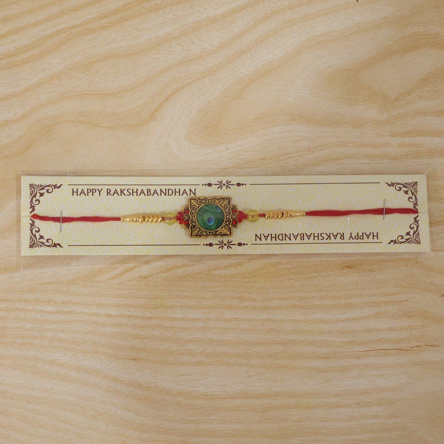 Antique Square Peacock Feather Rakhi