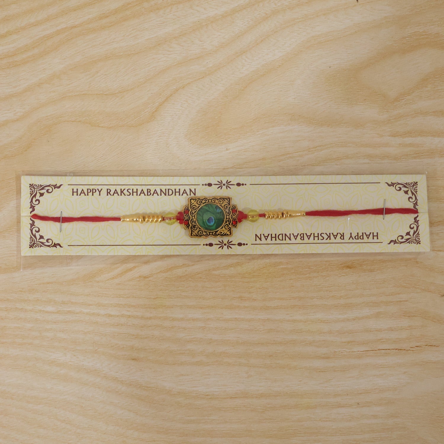 Antique Square Peacock Feather Rakhi