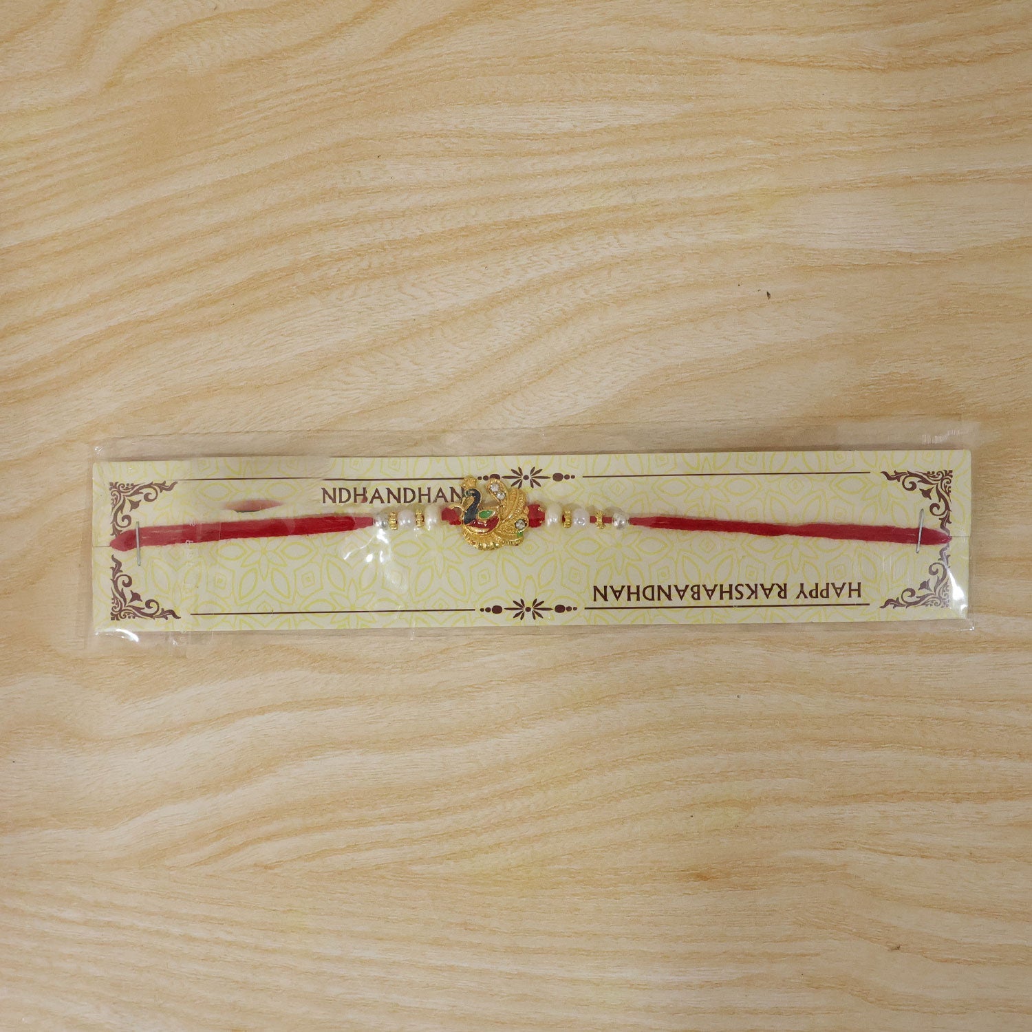 Meenakari Peacock Rakhi with Pearls