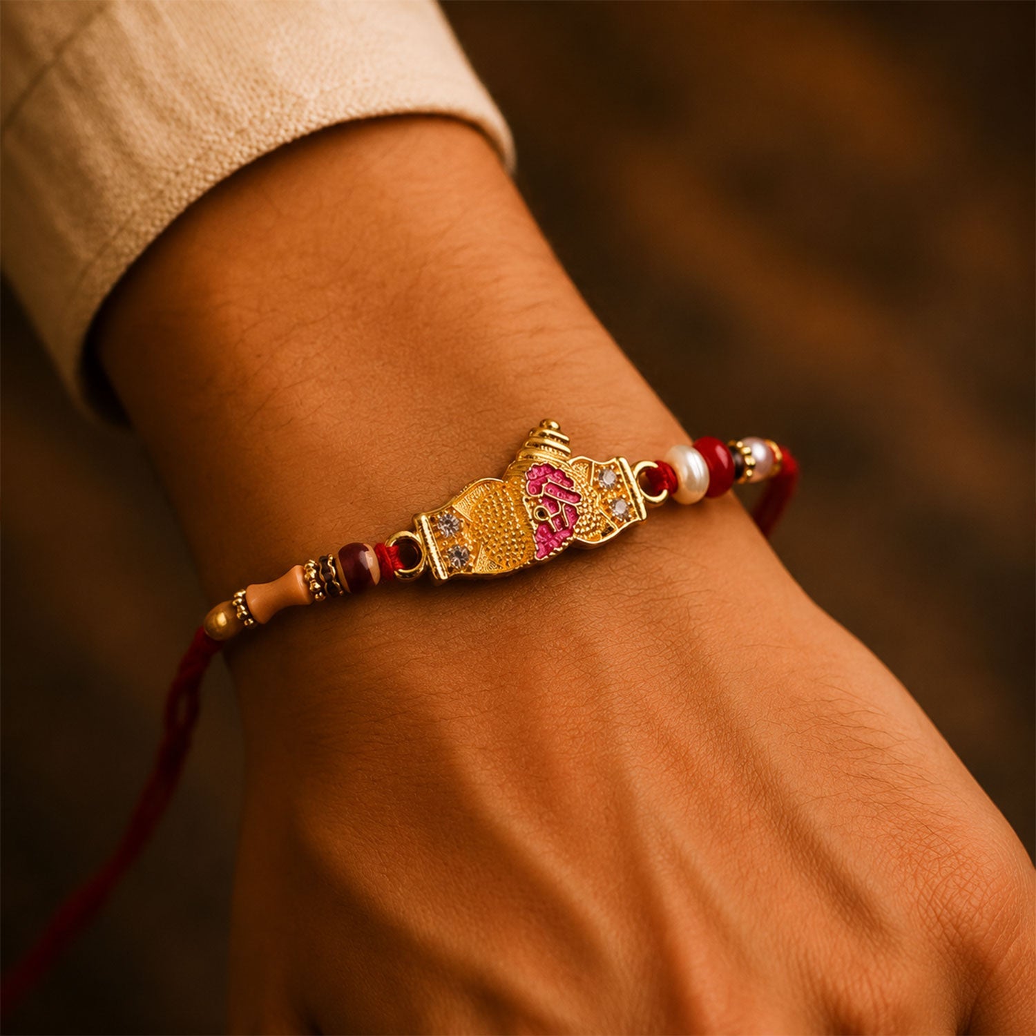Ornate Gold Meenakari Rakhi with CZ Stones