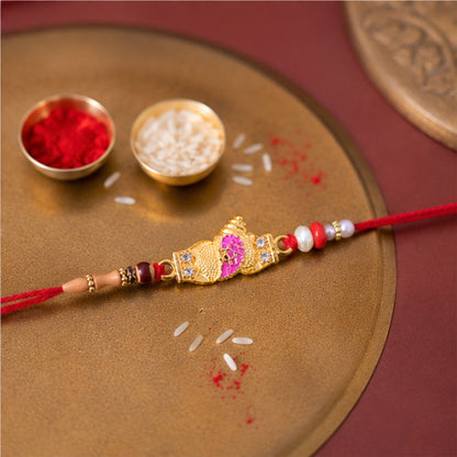 Ornate Gold Meenakari Rakhi with CZ Stones
